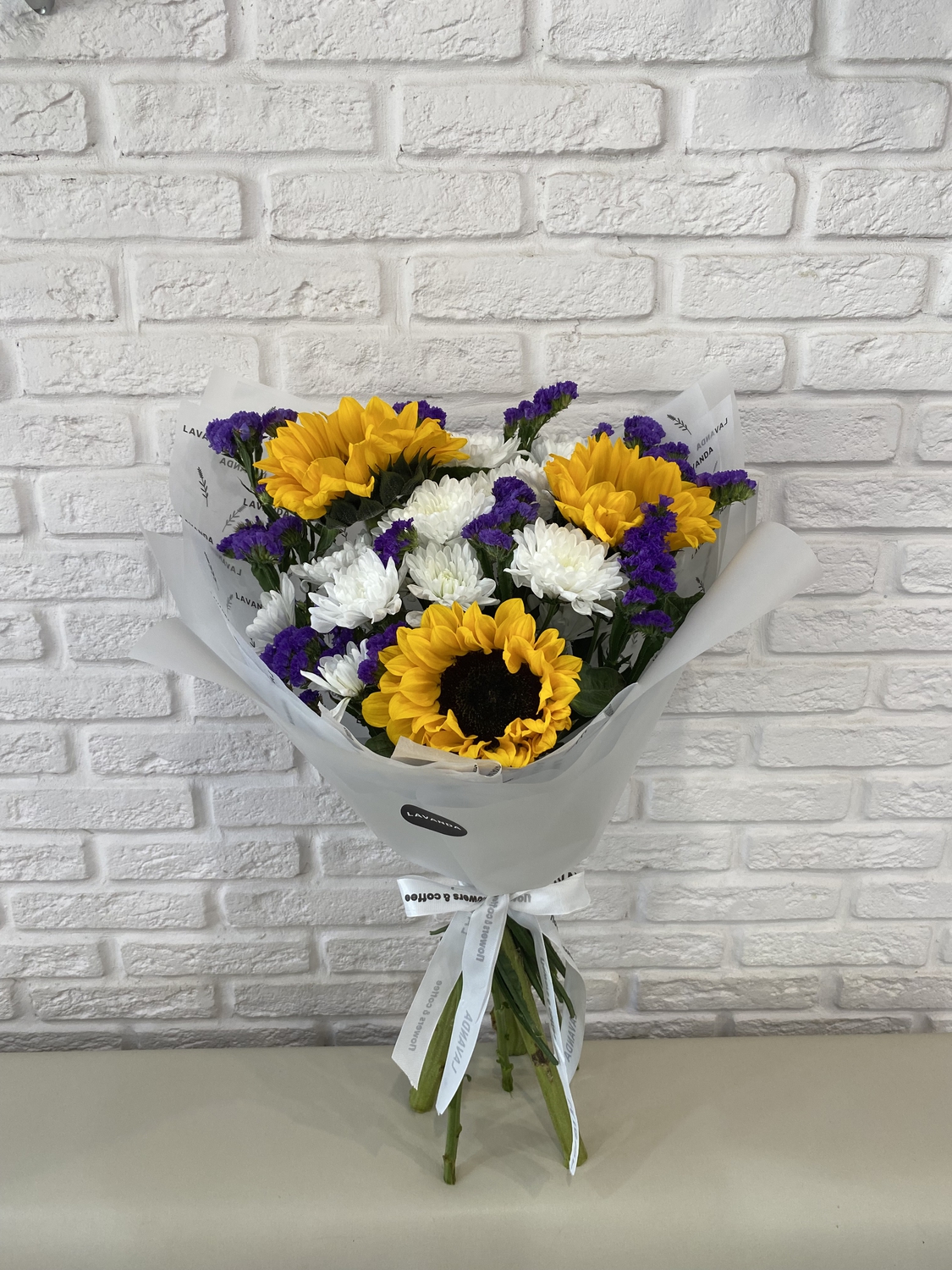 Букет подсолнухов и статицы